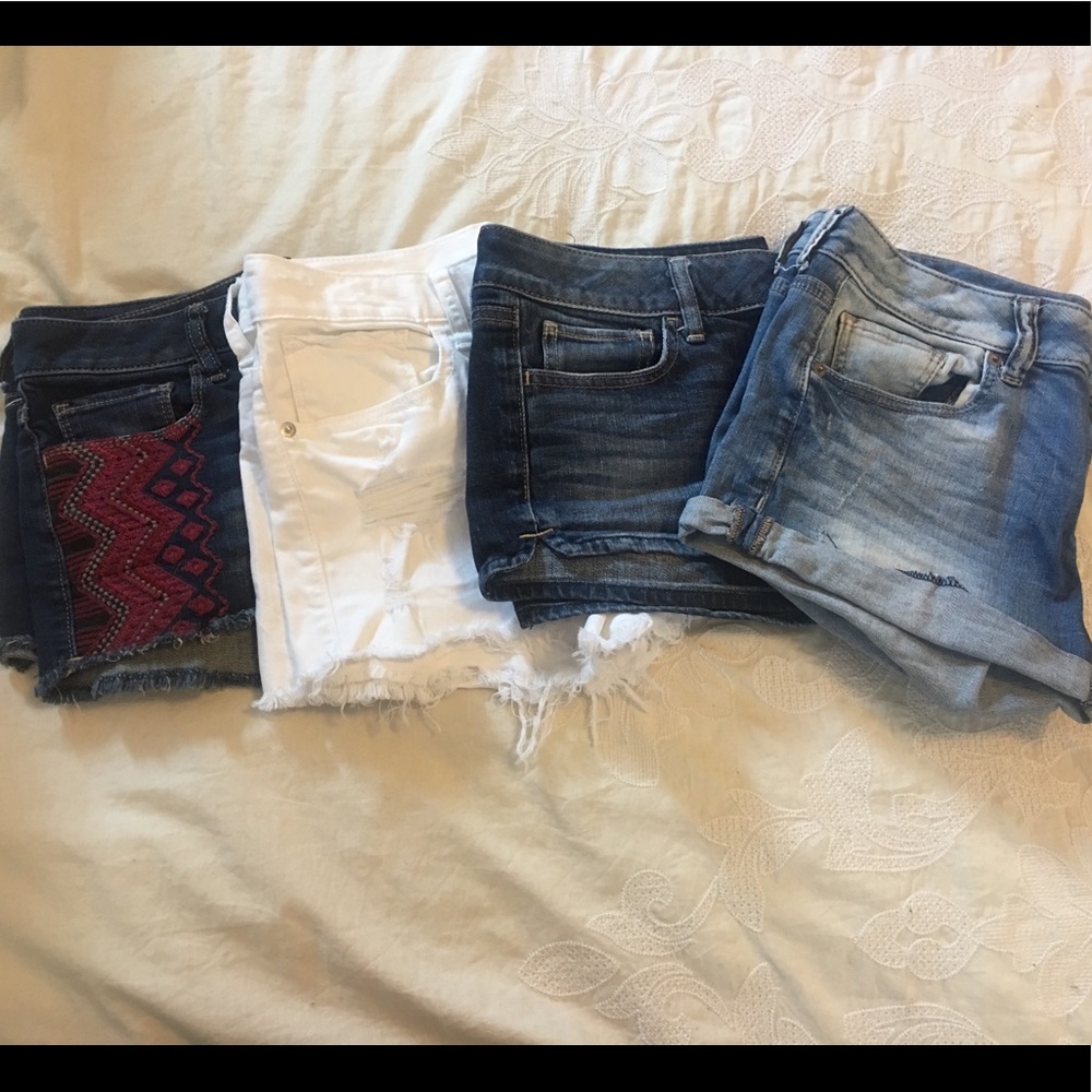 Lot of 4 Shorts. 3 Express 1 American Eagle
